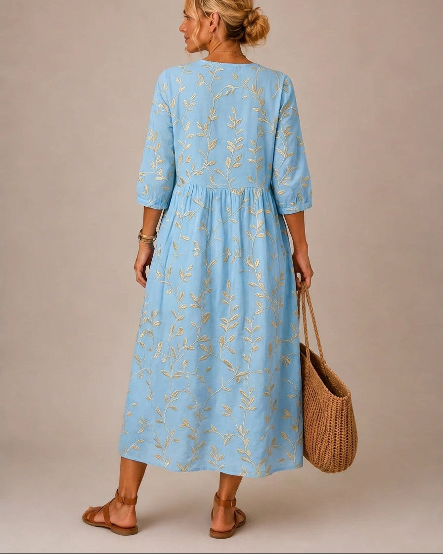 Vestido azul bordado con flores vintage