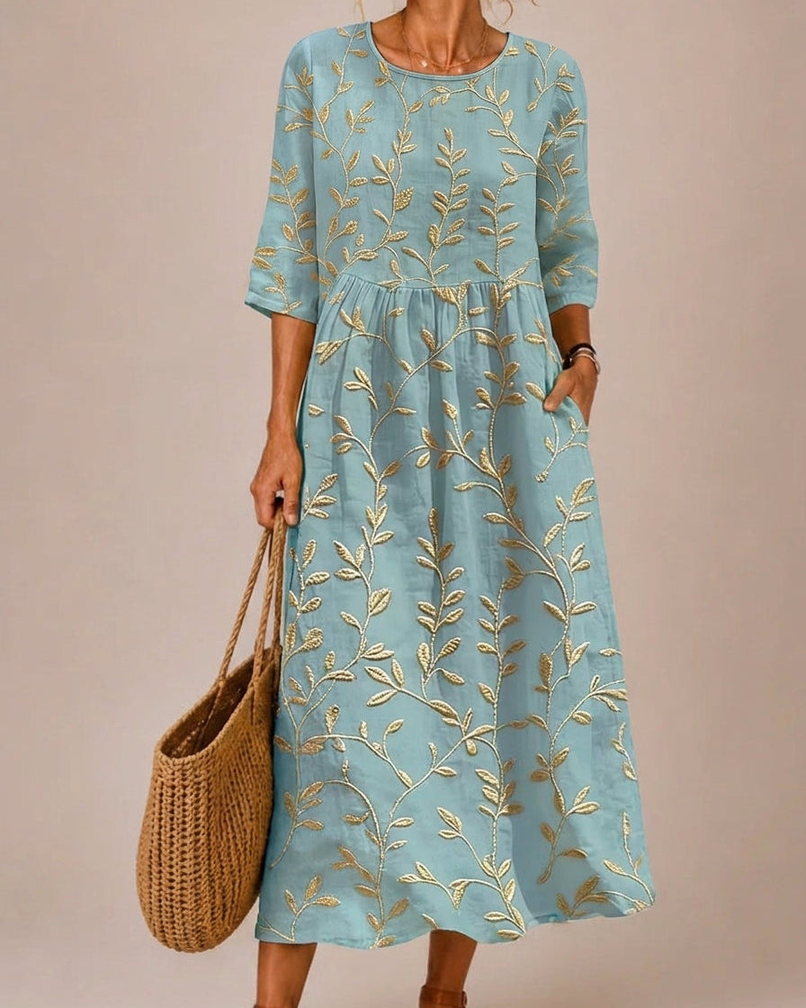 Vestido azul bordado con flores vintage