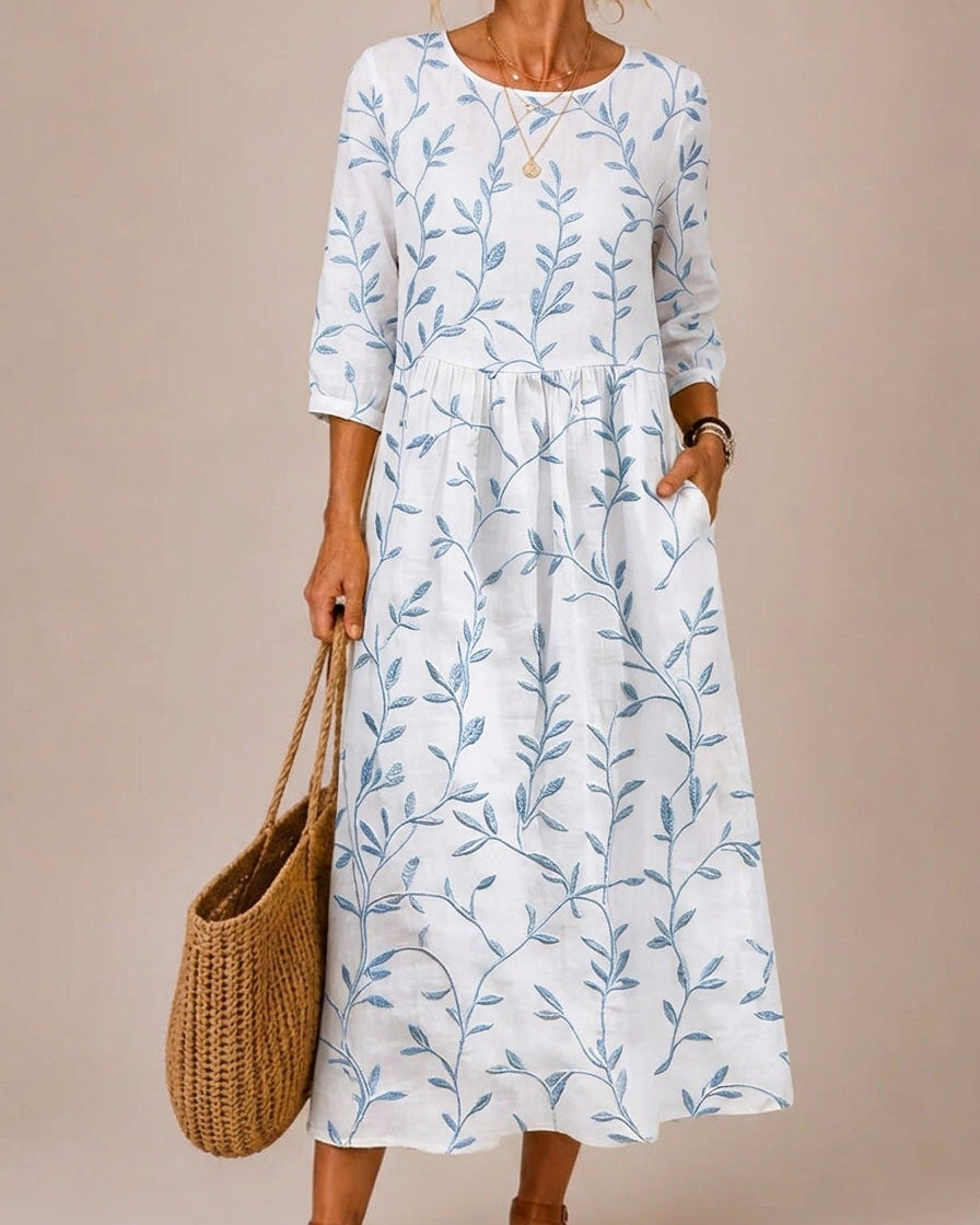 Vestido azul bordado con flores vintage