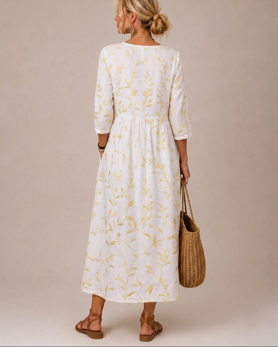 Vestido azul bordado con flores vintage